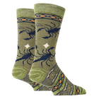 A pair of crew socks with a green base featuring a navy blue scorpion pattern, orange diamond accents, and a patterned border at the cuff and heel, shown on a white background.