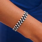 Model wearing Pura Vida Woven Seed Bead Checkerboard Black/White Bracelet