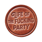 Round leather patch with 'Life of the Fucking Party' text on a white background