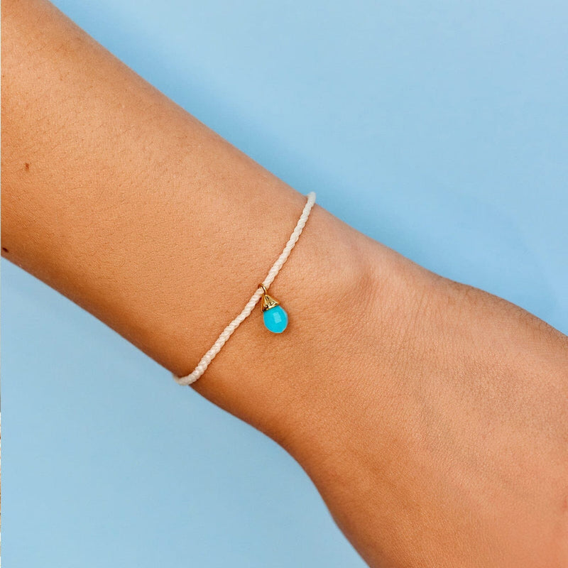 Model wearing Pura Vida Water Drop Charm Bracelet