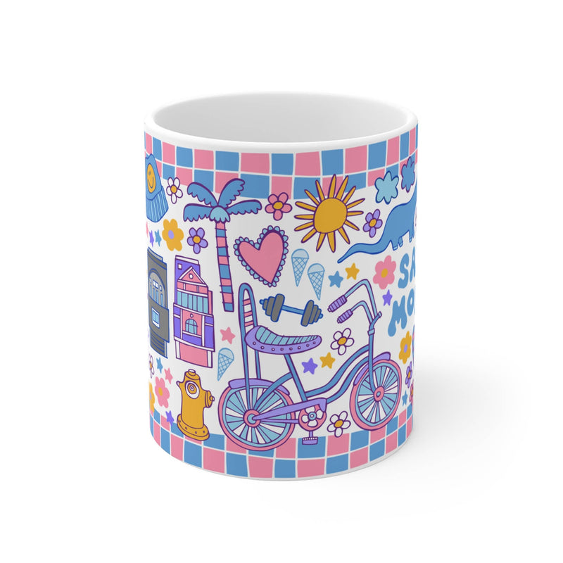 Ceramic mug with colorful design featuring a bicycle, heart, and various symbols on a checkered border.