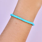 Model wearing Pura Vida Canal Blues Seascape Stretch Bracelet