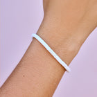 Model wearing Pura Vida White Seascape Stretch Bracelet