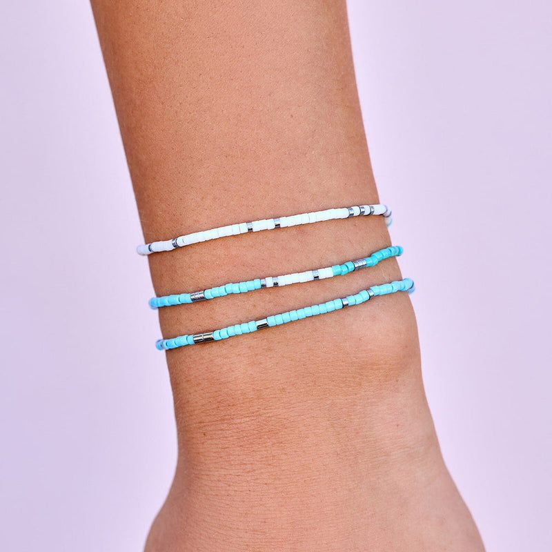 Model wearing Pura Vida Seafoam Dream Stretch Bracelet Set Of 3