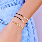 Model wearing Pura Vida Monochrome Stretch Bracelet Set Of 3