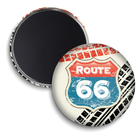 Round magnet with Route 66 design on a white background