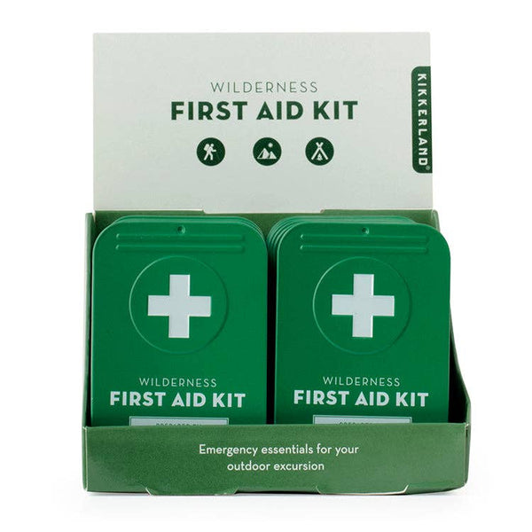 Two green first aid kits with a Kikkerland label on a white background
