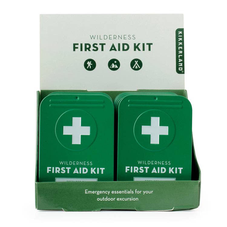 Two green first aid kits with a Kikkerland label on a white background