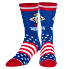 Pair of socks with American flag design and 'MERICA text on a white background