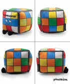 Colorful plush toy with checkered pattern and smiling face, displayed from multiple angles on a white background.
