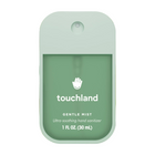 Touchland hand sanitizer bottle with a floral background