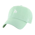Light green baseball cap with a logo on a white background