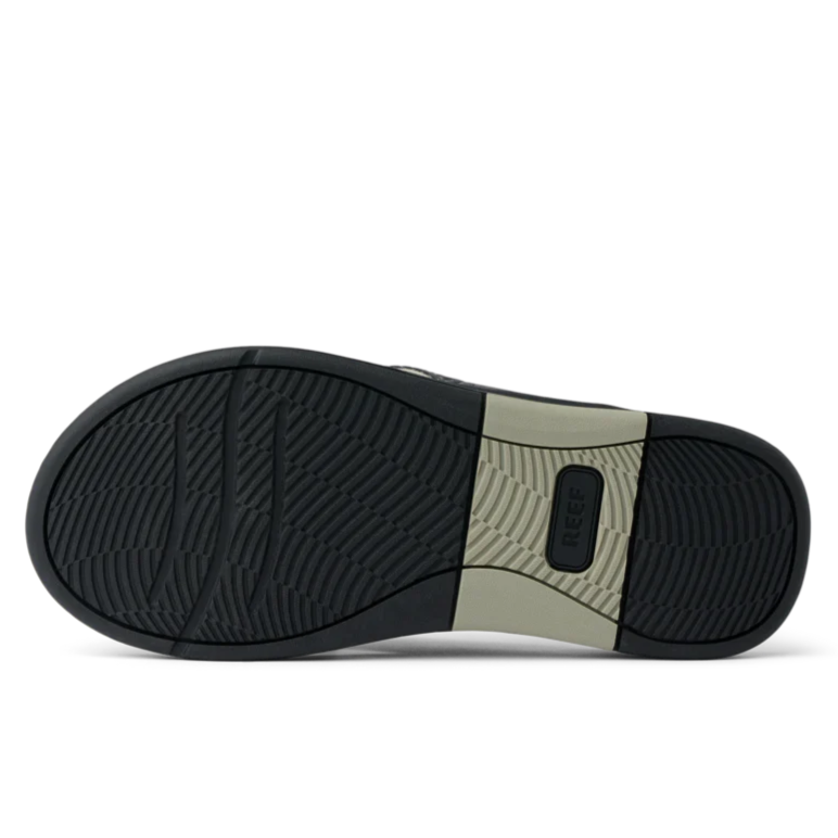 outer sole view of Reef Offshore Grey/Black/Tan Men's Sandals with a black sole and beige heel cup on a white background