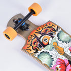 Skateboard with a colorful deck design featuring a guitar, flowers, and abstract elements on a white background.