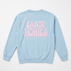 Light blue sweatshirt with 'Santa Monica California' text on a light gray background