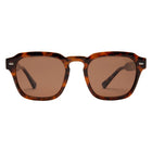 Sunglasses with tortoiseshell frame and brown lenses on a white background