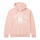 Pink hoodie with 'Santa Monica California' text on a light gray background