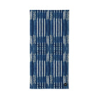 Blue and white patterned towel on a light gray background