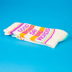 Stack of socks with colorful text on a blue background