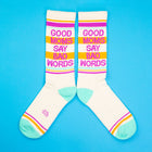 White socks with colorful text and accents on a blue background