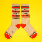 Beige socks with 'My Farts Don't Stink' text on a yellow background