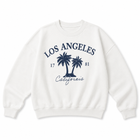 An off-white crewneck sweatshirt featuring a navy blue graphic print on the front with the text 'LOS ANGELES', 'California', '17', and '81' surrounding two palm trees.