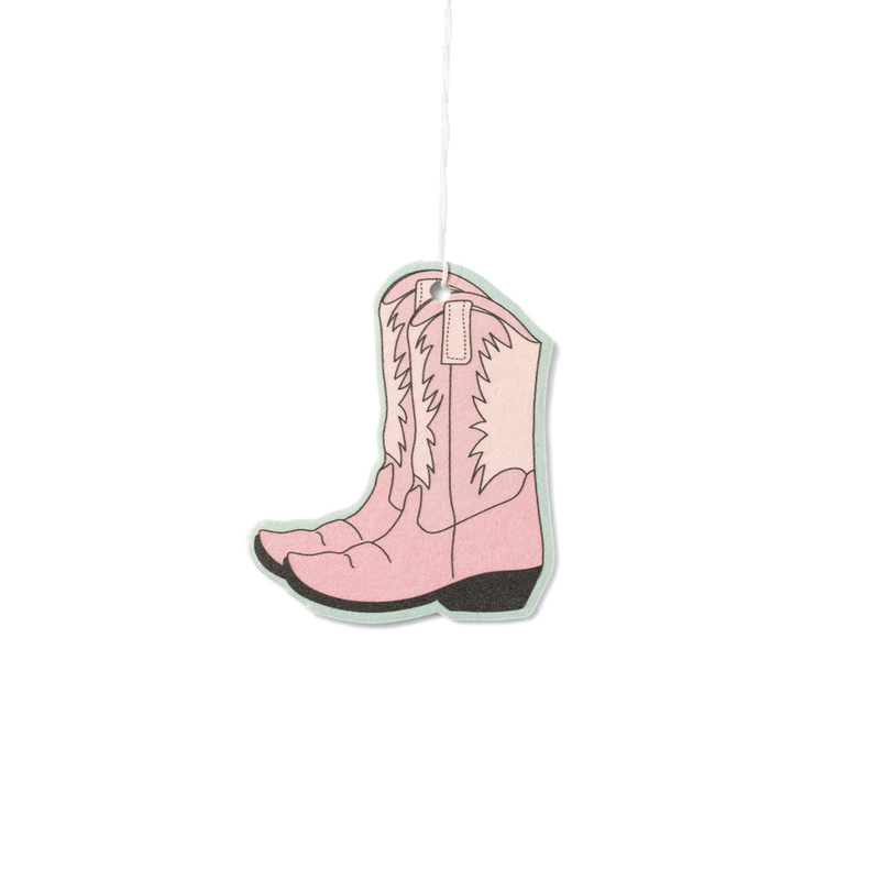Pink cowboy boot air freshener on a white background