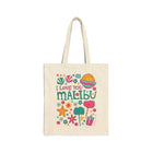 A cream-colored canvas tote bag with long handles, featuring a colorful graphic print that reads 'I Love You MALIBU' surrounded by tropical and beach-themed illustrations, set against a plain white background.