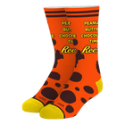 Orange socks with text and polka dots on a white background