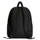 The back view of a black backpack with padded shoulder straps and side pockets, shown against a light gray studio background.