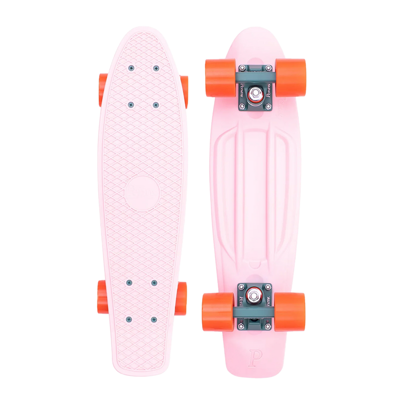  A pink Penny skateboard with orange wheels, shown from both the top and bottom views, featuring a textured grip surface and a sturdy plastic deck