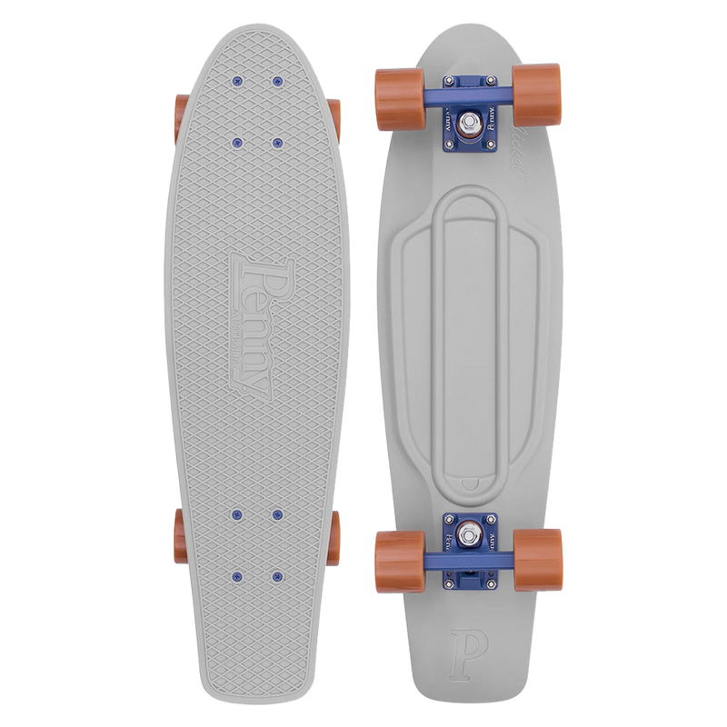 A grey Penny skateboard with brown wheels, shown from both the top and bottom views, featuring a textured grip surface and a sturdy plastic deck