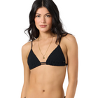 Woman wearing a black bikini top on a white background