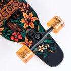 Skateboard with floral design and orange wheels on a white background