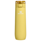 Yellow Stanley water bottle on a white background