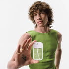 Model holding Applelicious Power Mist Hydrating Hand Sanitizer