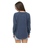 Woman wearing a USA Graphic Raglan Navy Long Sleeve Knit Top back view