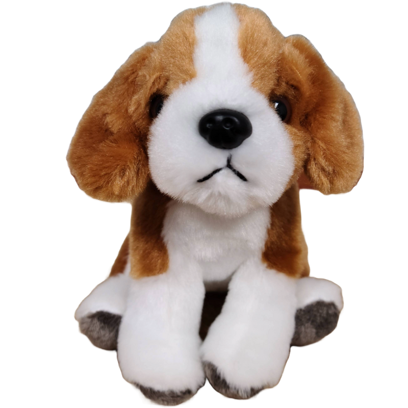 Plush toy dog with brown, white, and black fur on a white background