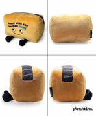 Plush toy resembling a bag with wheels and a face, labeled 'punchkins', on a white background.
