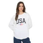 Woman wearing a white sweatshirt with 'USA' and an American flag design on a white background