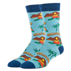 A pair of light blue crew socks with a colorful California-themed graphic print, featuring palm trees, sunsets, and the word 'CALIFORNIA' in yellow. The socks have dark blue ribbed cuffs, heels, and toes, and are shown against a plain white background.