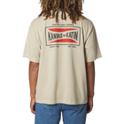 A person shown from the back wearing a beige short-sleeve T-shirt with a large 'Kanvas by Katin' graphic on the back, paired with blue jeans, against a light gray studio background.