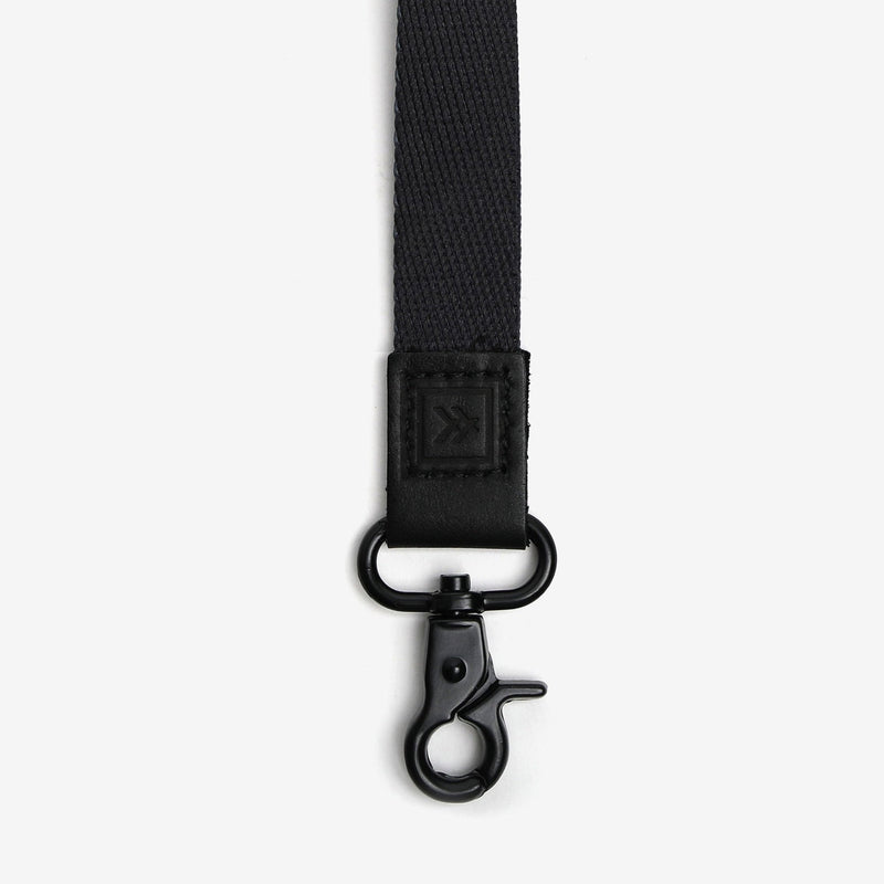 Black lanyard with a clasp on a white background